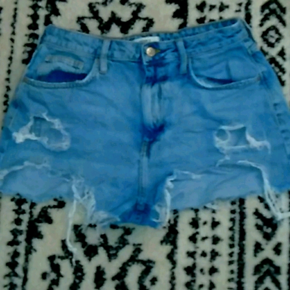 Light blue ripped shorts
